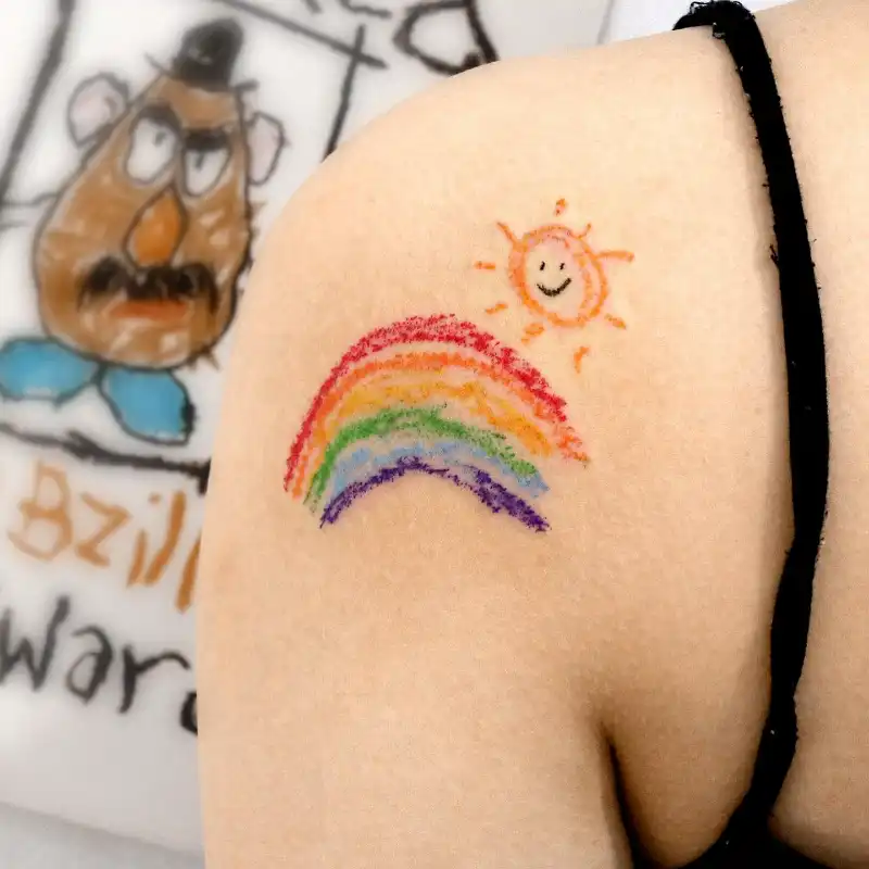 Childlike Crayon Rainbow Tattoo