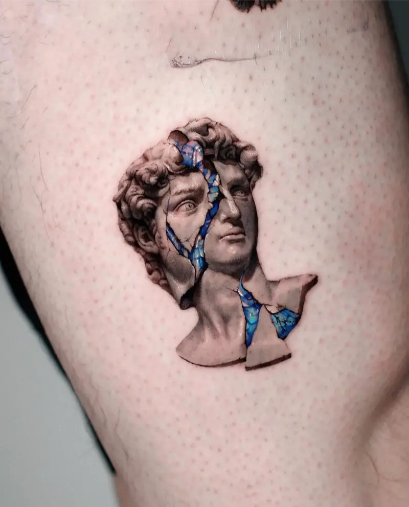 Cracked David Bust Tattoo with Blue Veins