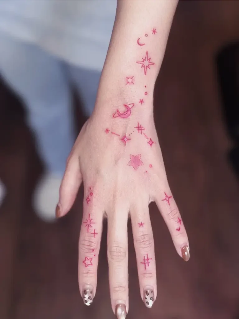 Cute Pink Celestial Hand Tattoo