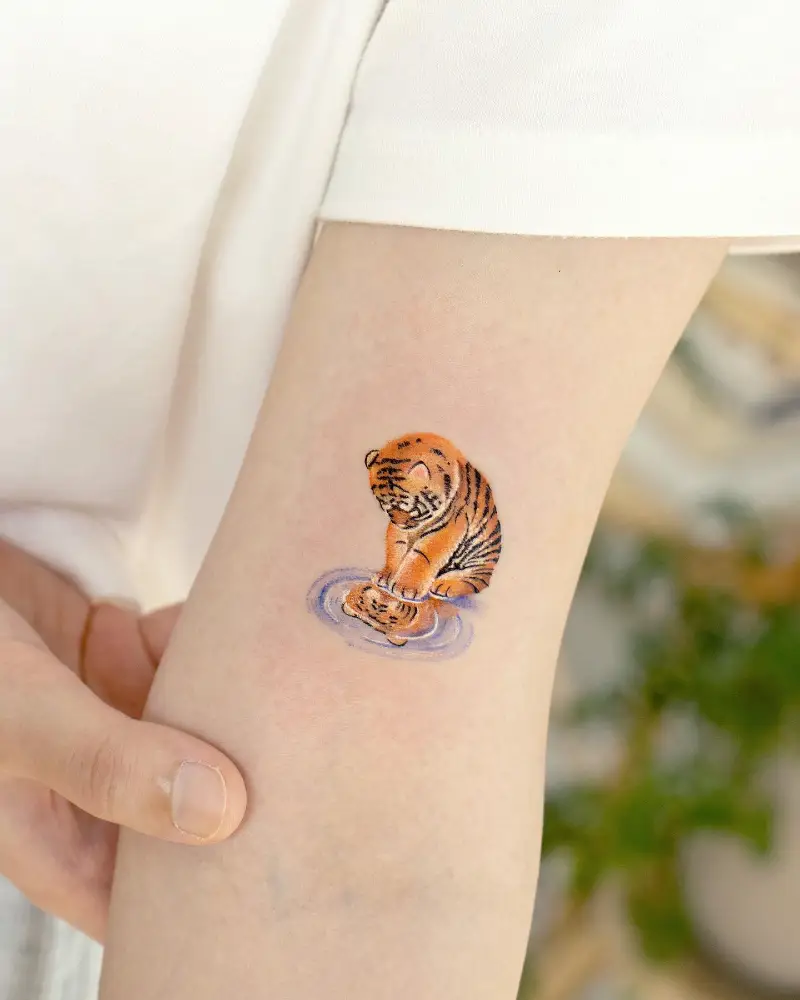 Delicate Tiger Cub Reflection Tattoo
