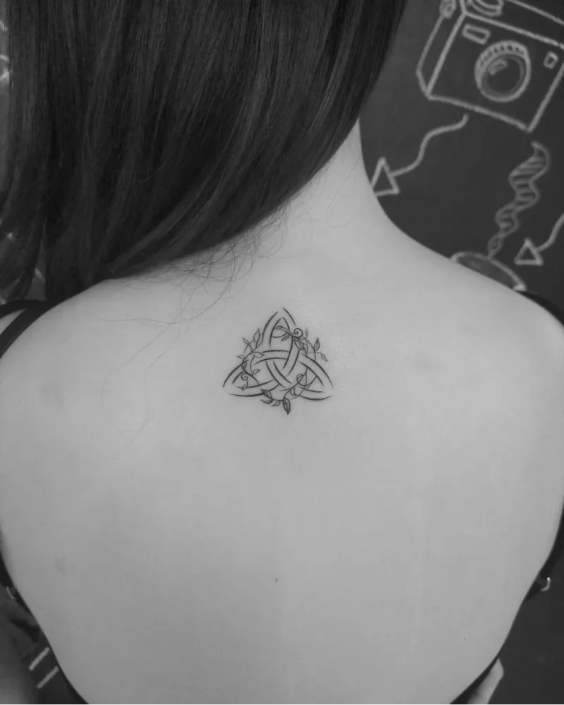 Delicate Trinity Knot Back Tattoo