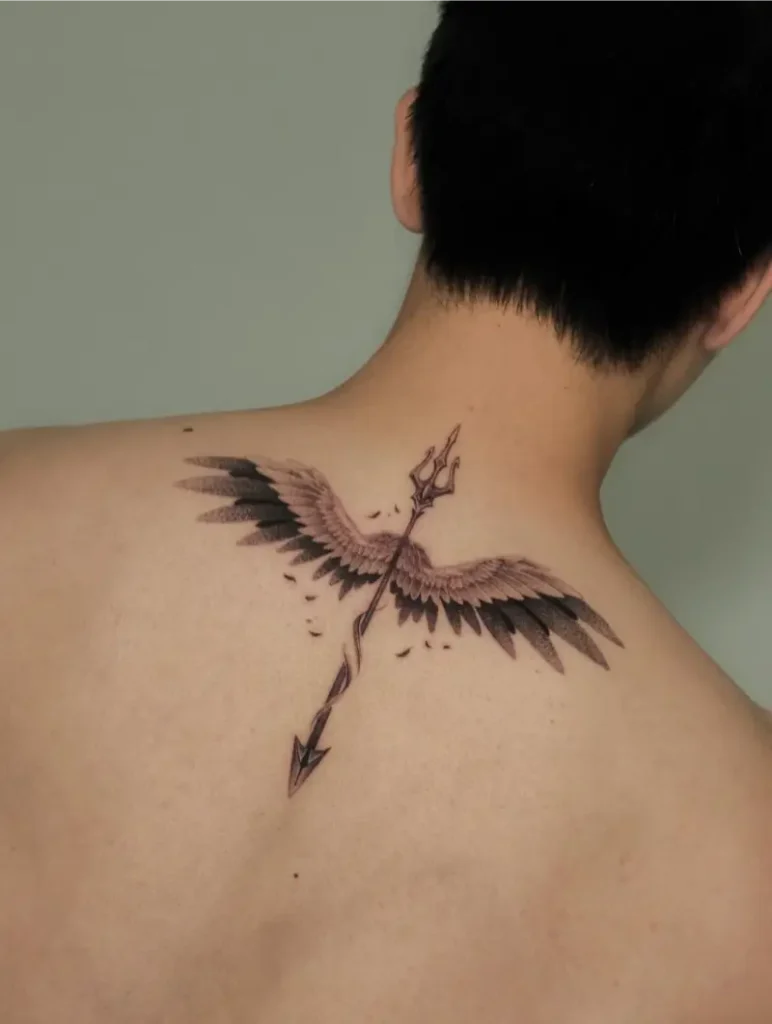 Dynamic Winged Trident Arrow Tattoo
