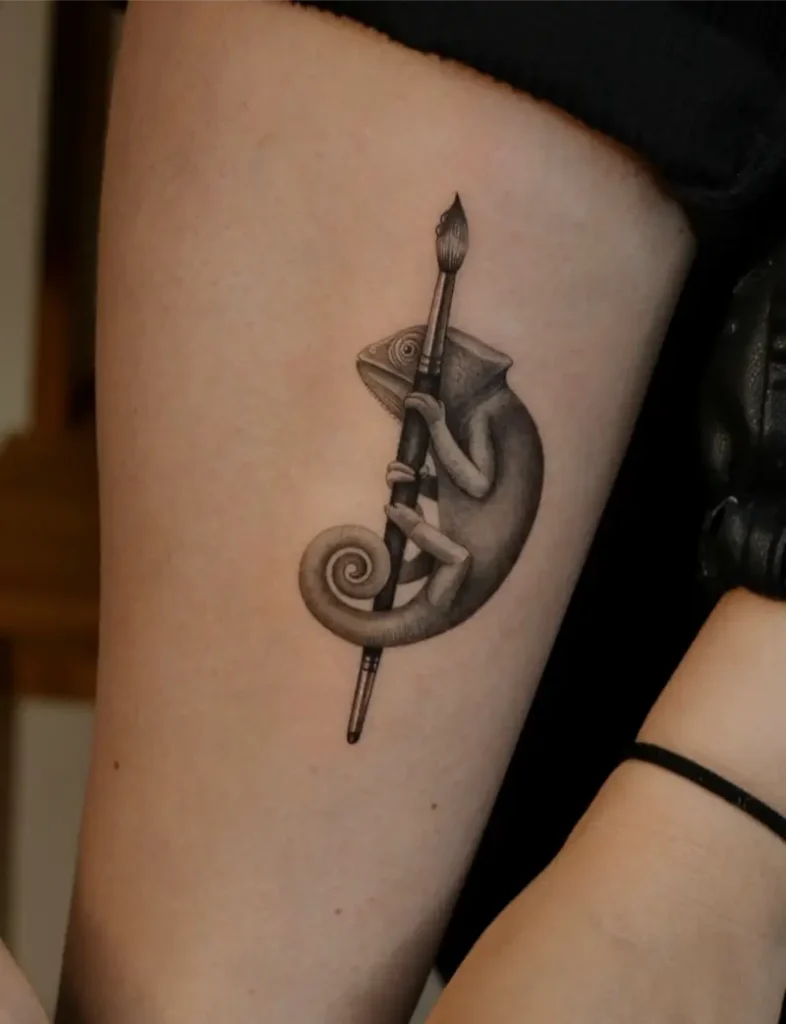 Fine Line Chameleon Paintbrush Tattoo