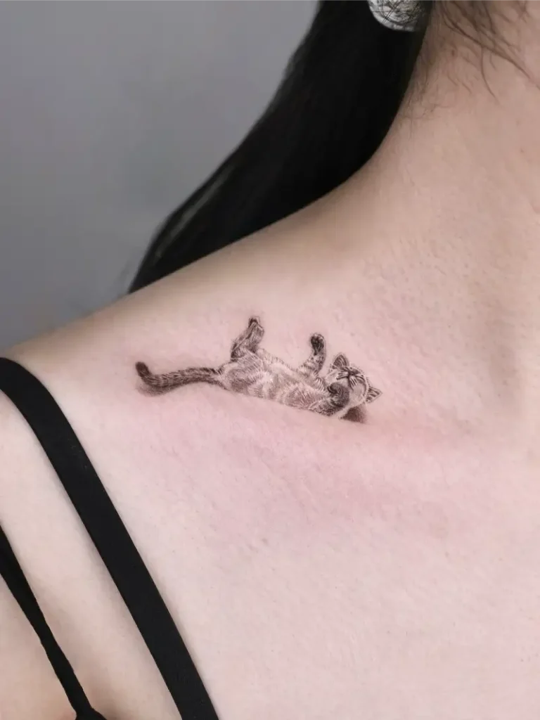 Fine Line Playful Cat Portrait Tattoo
