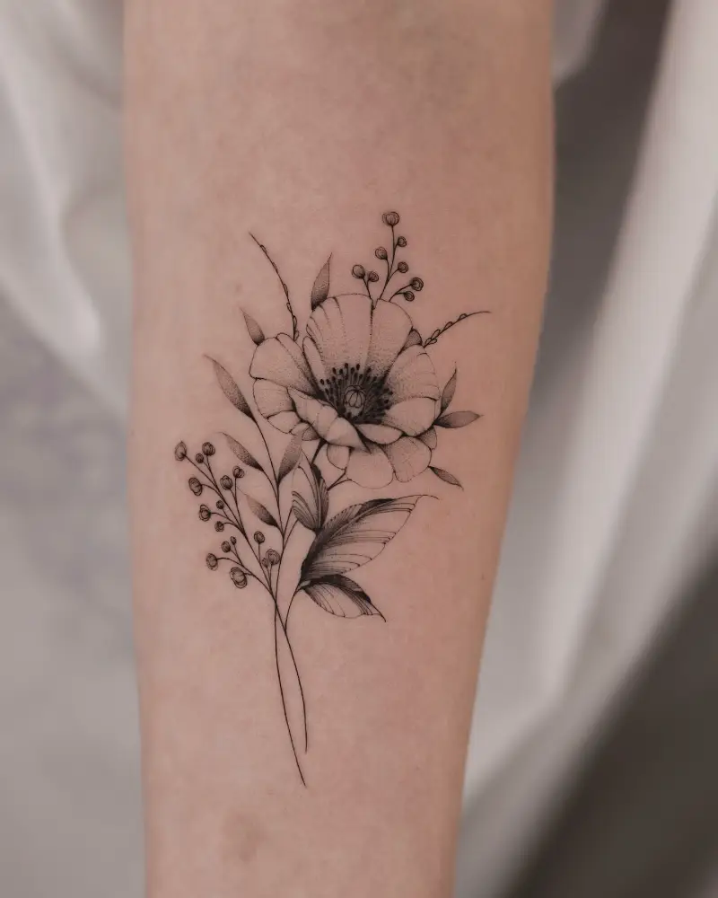 Fine Line Poppy and baby breath Tattoo