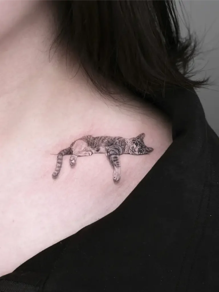 Fine Line Resting Cat Portrait Tattoo