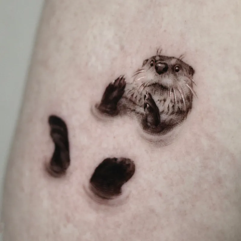 Floating in Water Otter Tattoo