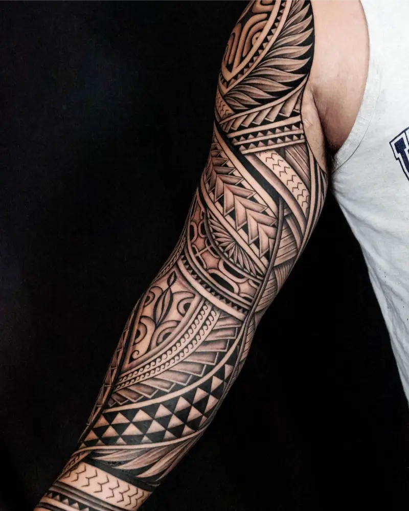 Flowing Polynesian Full Sleeve Tattoo