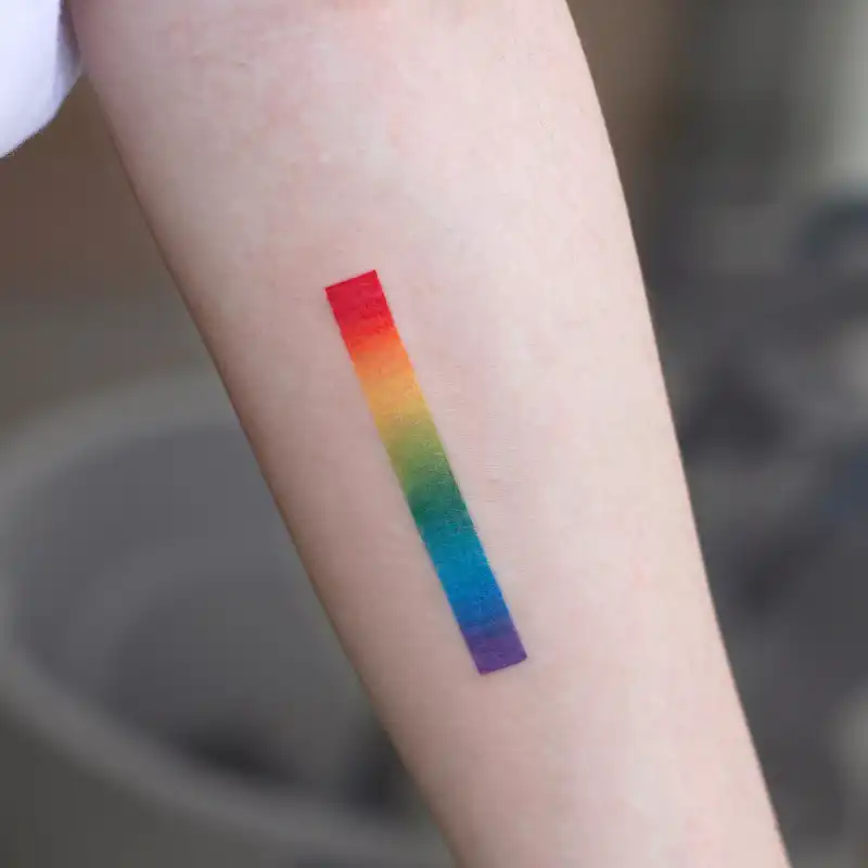 Geometric Rainbow Gradient Bar Tattoo