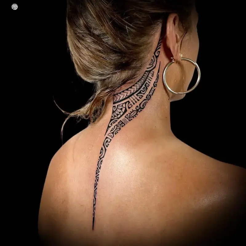 Graceful Polynesian Spine Tattoo