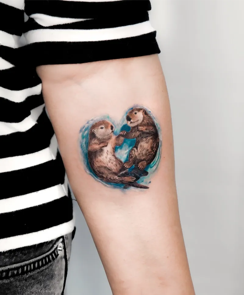 Heart-Shaped Pair Otter Tattoo