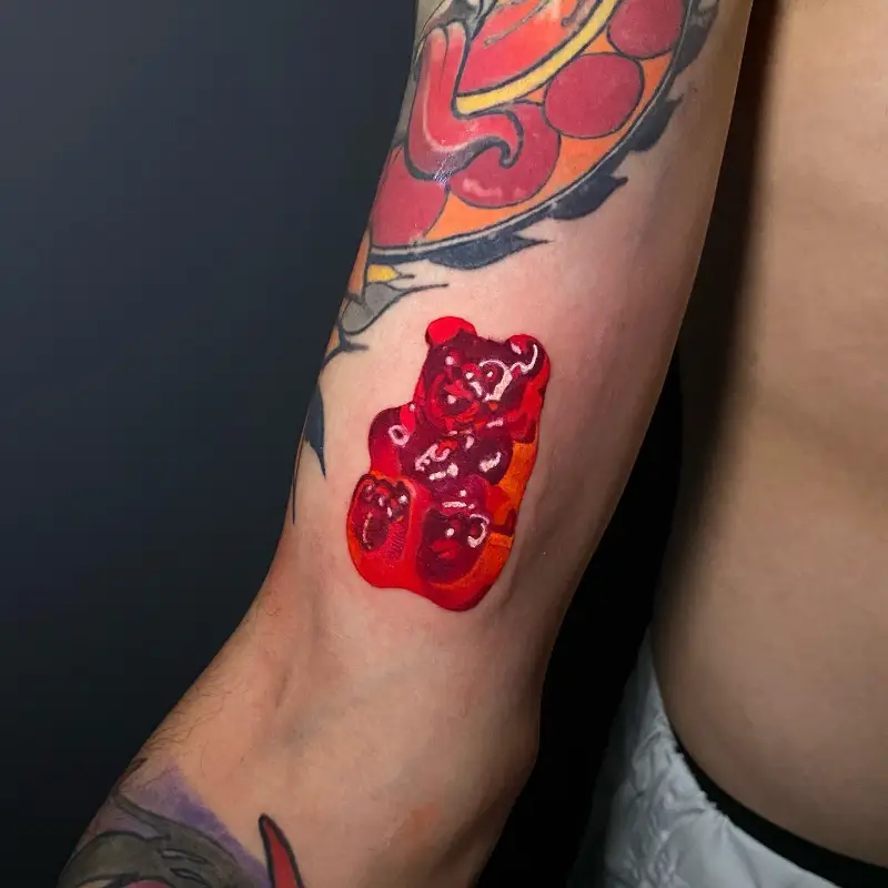 Hyper Realistic Red Gummy Bear Tattoo
