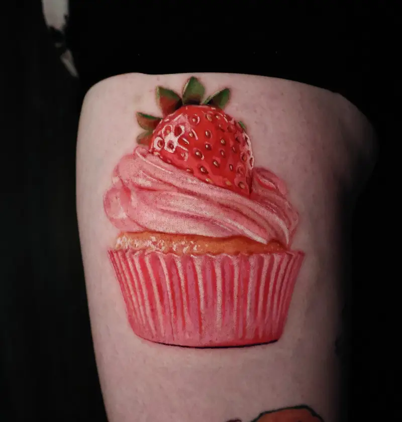 Hyper Realistic Strawberry Cupcake Tattoo
