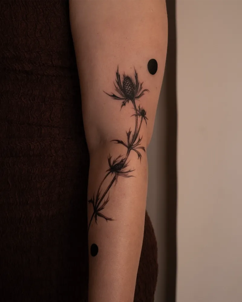Illustrative Blackwork Thistle Tattoo
