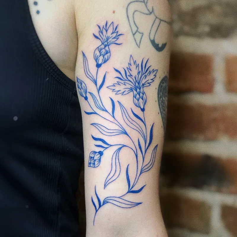 Illustrative Blue Linework Cornflower Tattoo