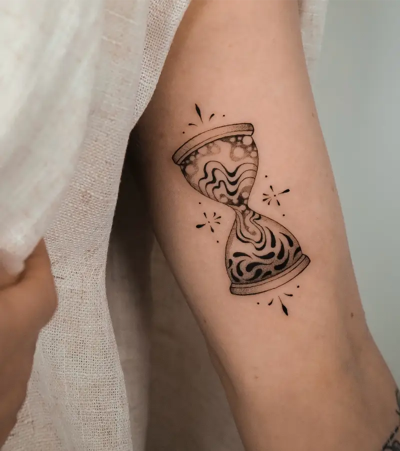 Illustrative Patterned Hourglass Tattoo