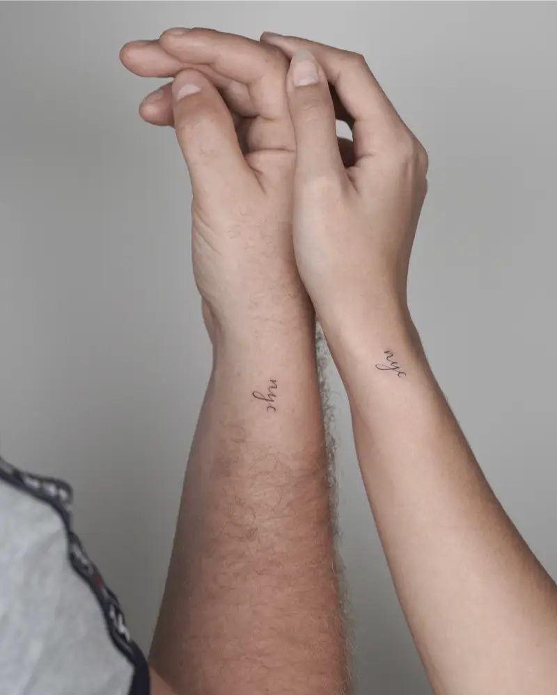Matching NYC Script Tattoo