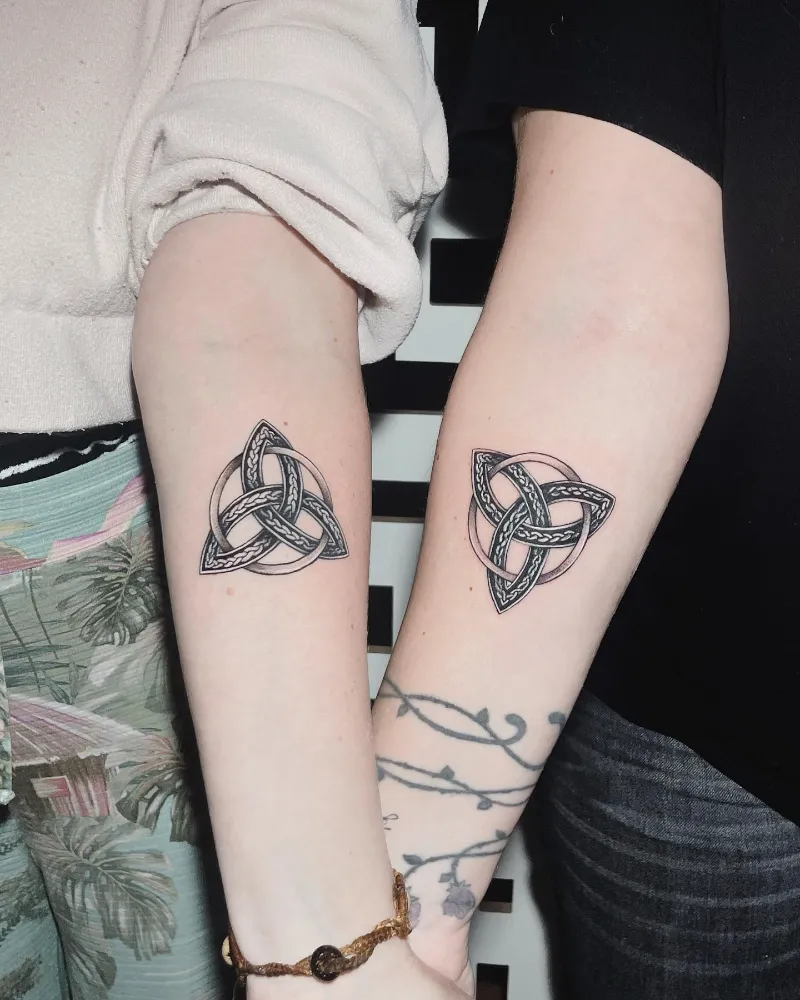 Matching Trinity Knot Couple Tattoos