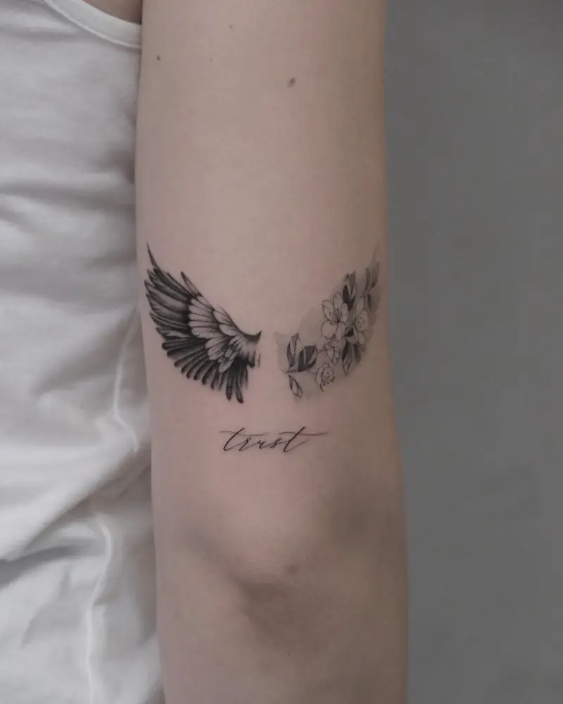 Meaningful Floral Wing Tattoo