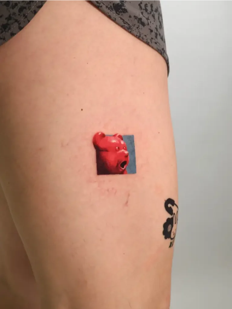 Micro Realistic Gummy Bear Portrait Tattoo
