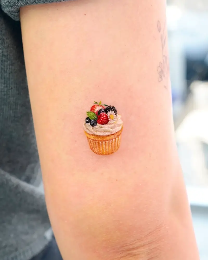 Micro Realistic Mixed Berry Cupcake Tattoo