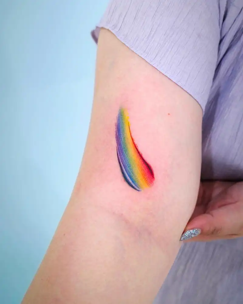 Minimal Rainbow Brushstroke Tattoo