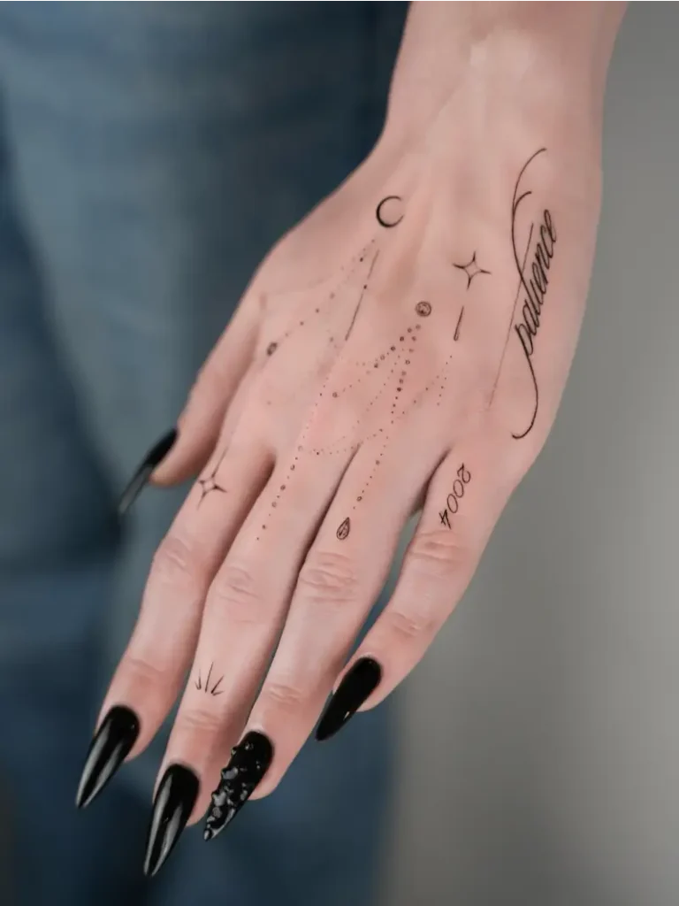 Minimalist Celestial Linework Hand Tattoo