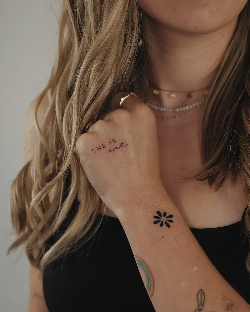 Minimalist Lettering Statement Hand Tattoo