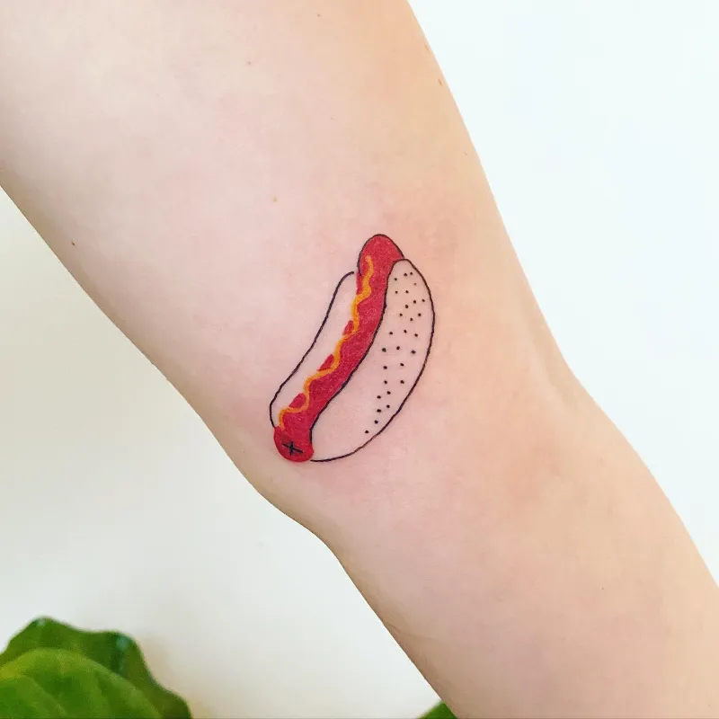 Minimalist Tiny Hot Dog Tattoo