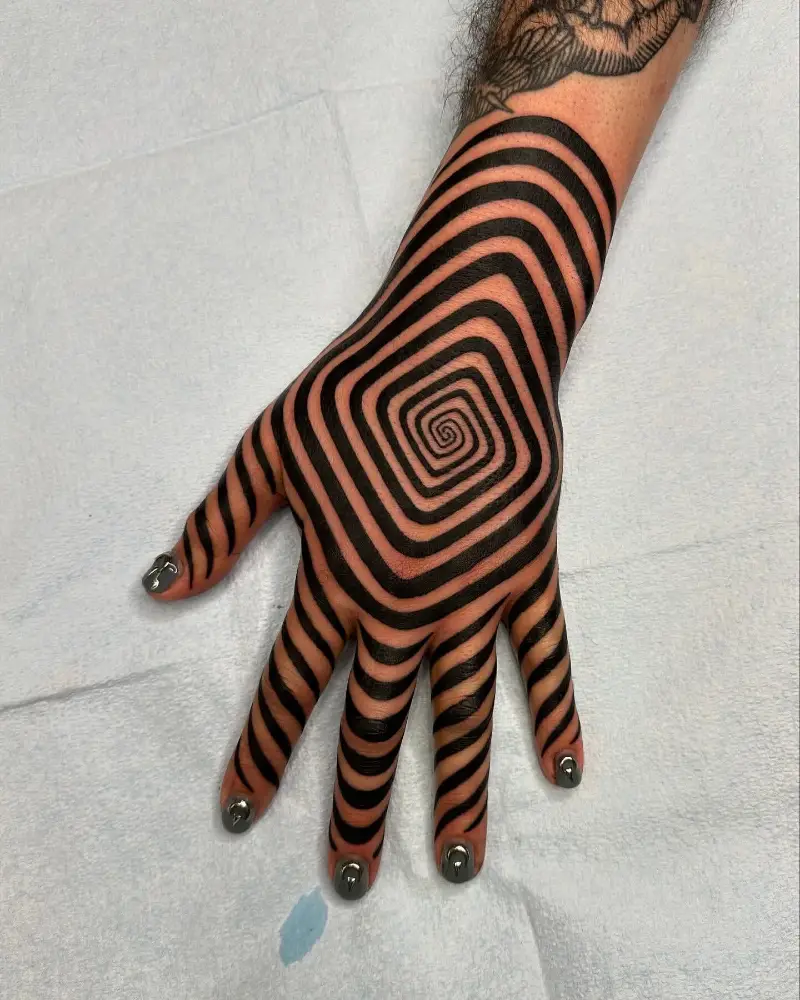Optical Spiral Blackwork Hand Tattoo