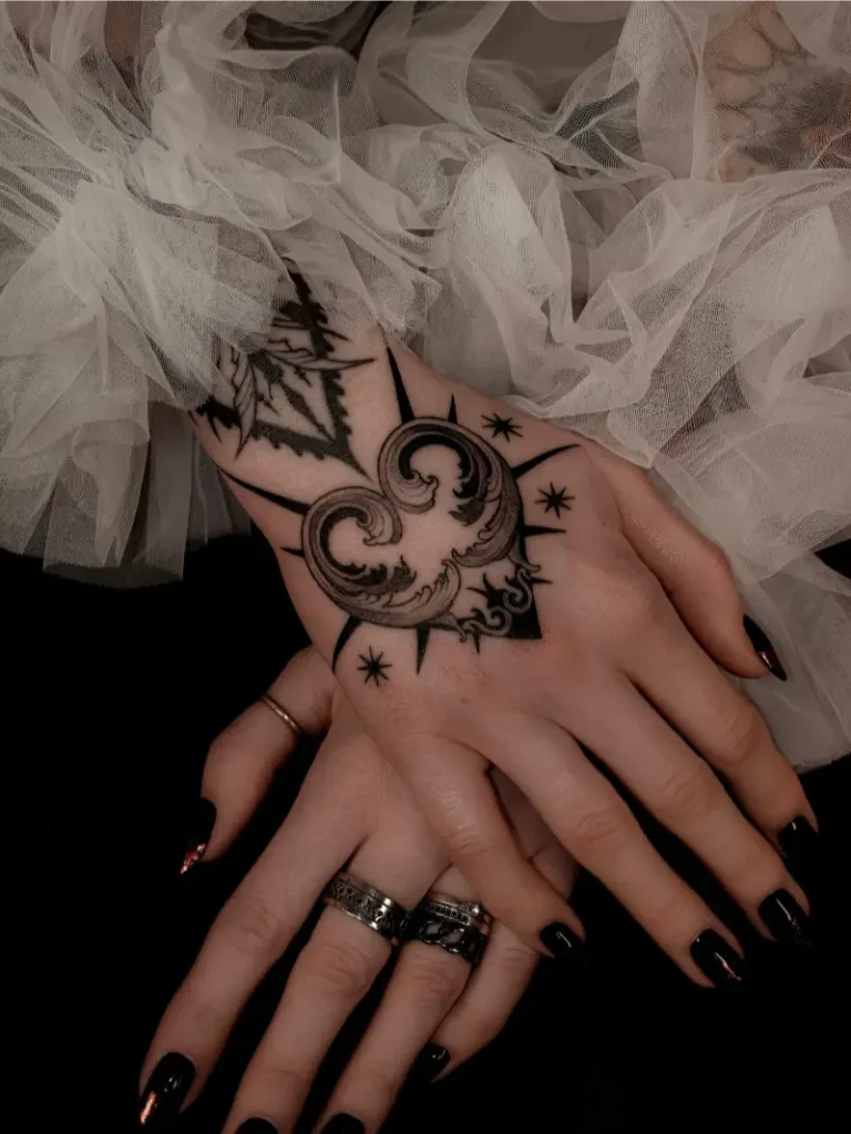 Ornamental Gothic Heart Hand Tattoo