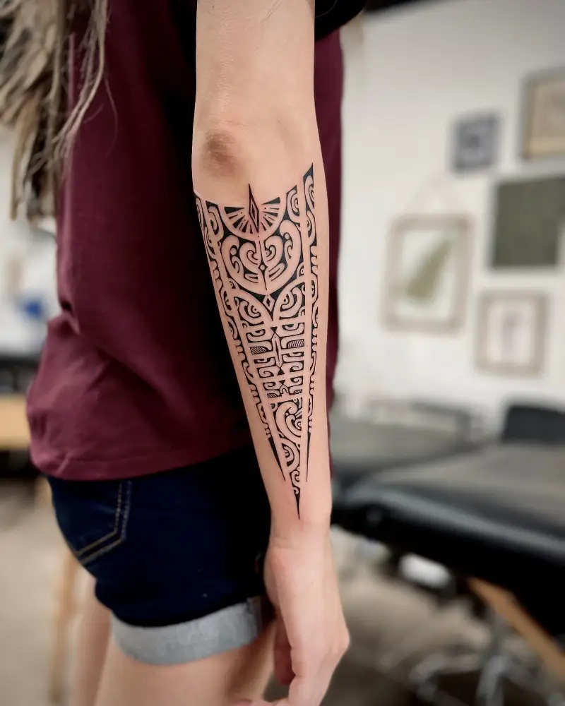 Ornamental Polynesian Spear Forearm Tattoo