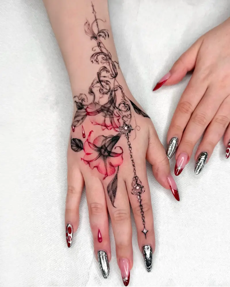 Ornamental Angel's Trumpet Hand Tattoo