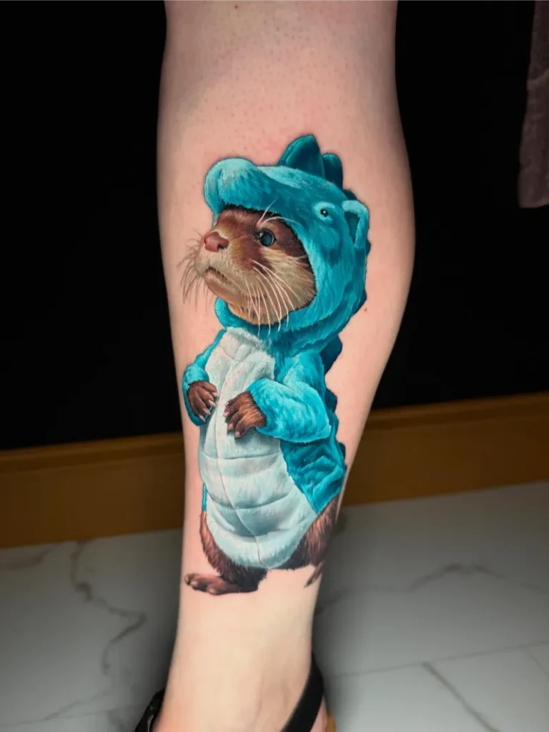 Otter in Dinosaur Costume Tattoo