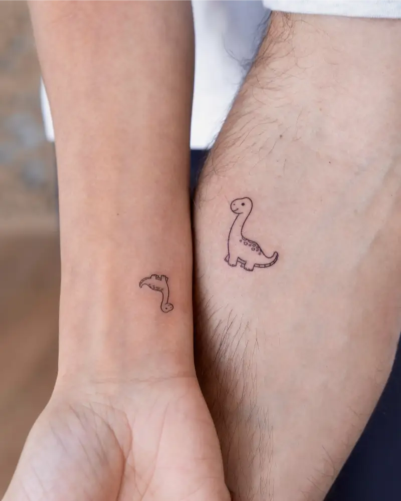 Playful Dinosaur Matching Couple Tattoo