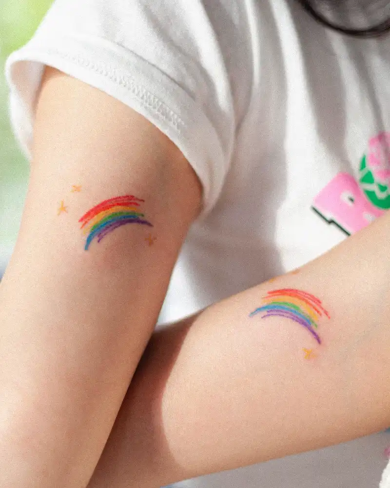 Playful Matching Rainbow Tattoo