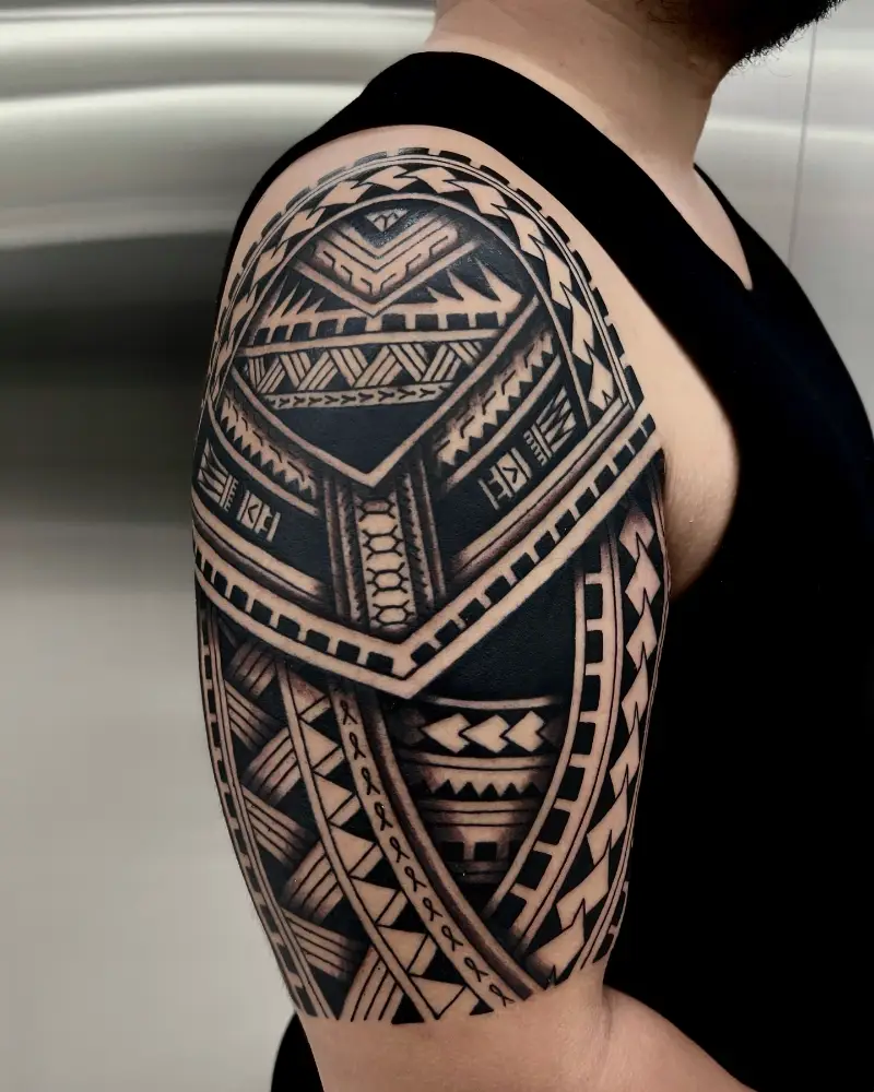 Powerful Polynesian Shoulder Panel Tattoo