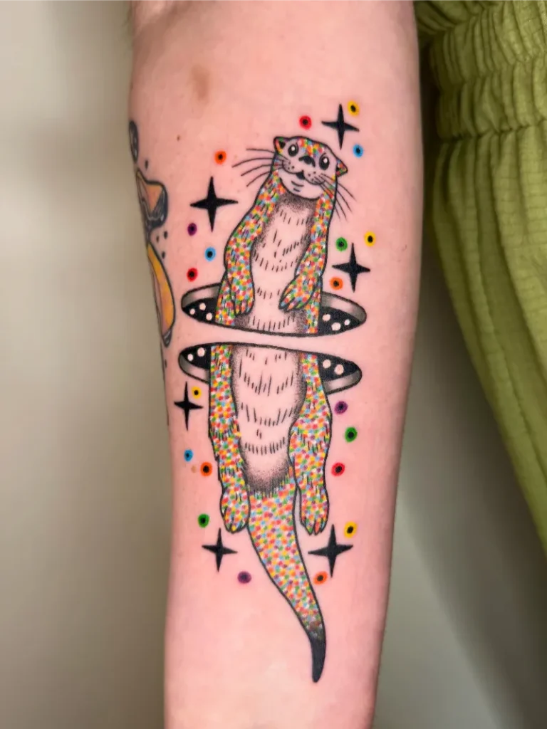 Psychedelic Cosmic Otter Tattoo