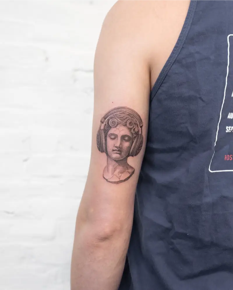 Realistic Music Lover Statue Tattoo