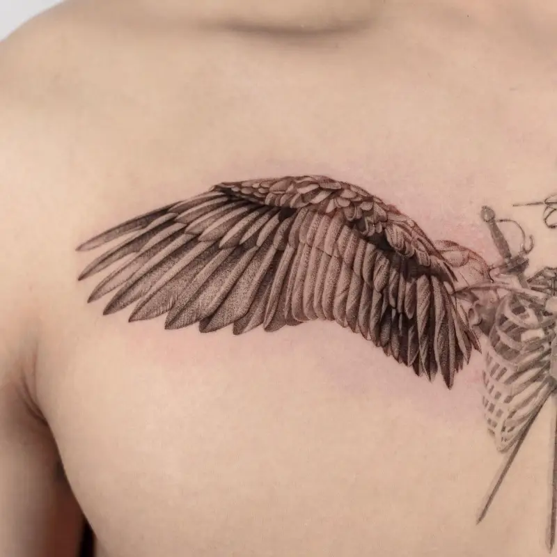 Realistic Single Wing Chest Tattoo