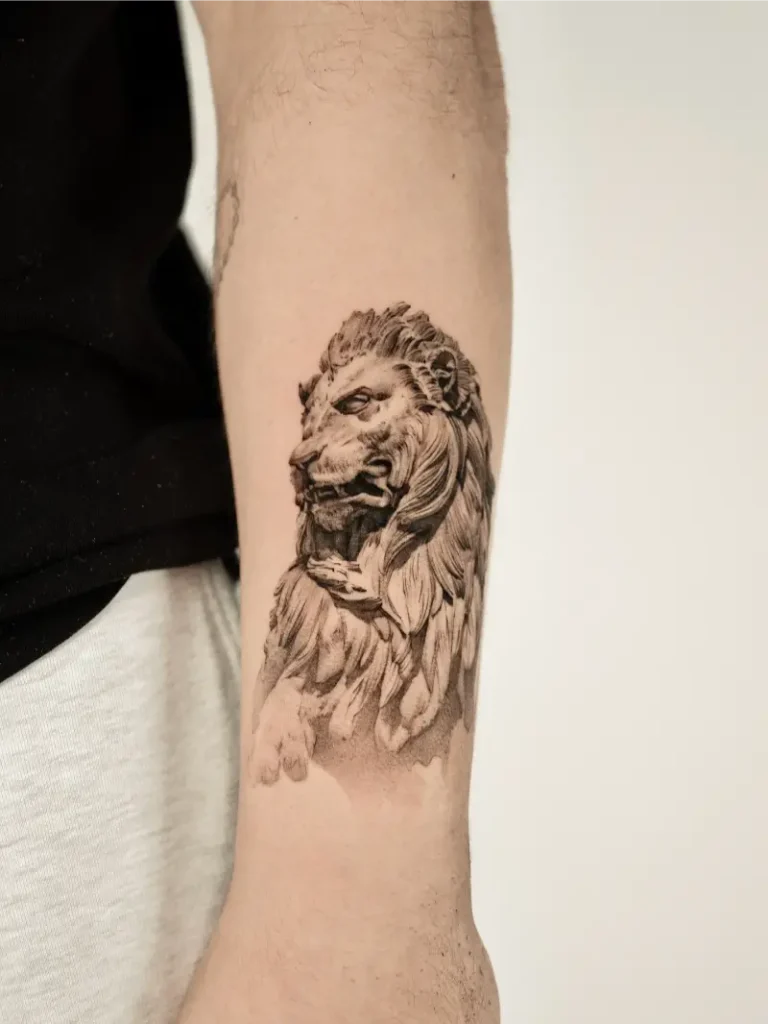 Realistic Stone Lion Statue Tattoo