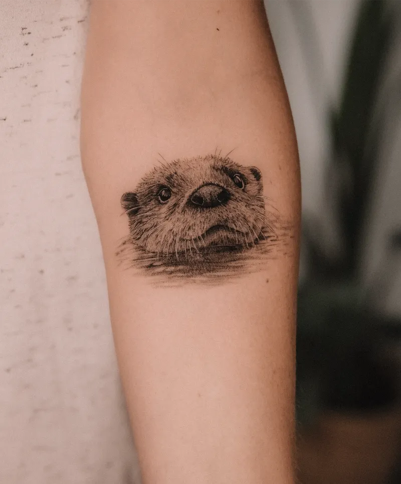 Realistic Swimming Otter Portrait Tattoo