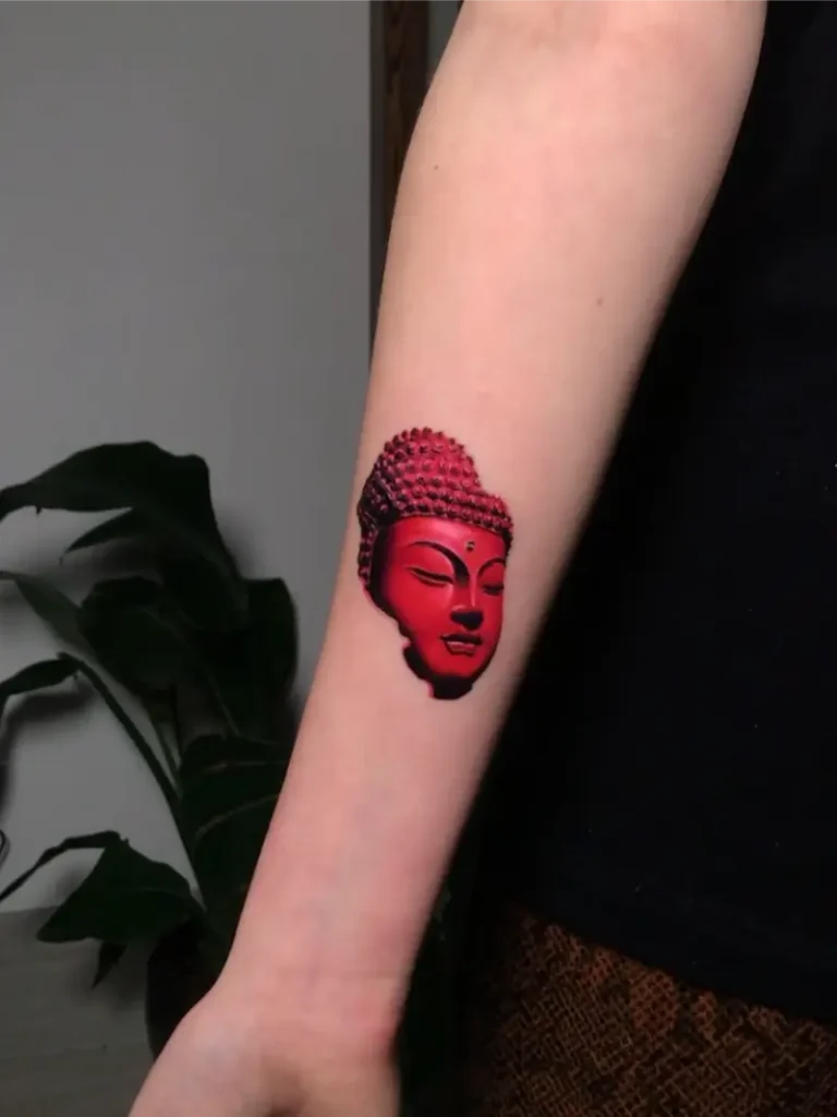 Red Ink Buddha Head Tattoo
