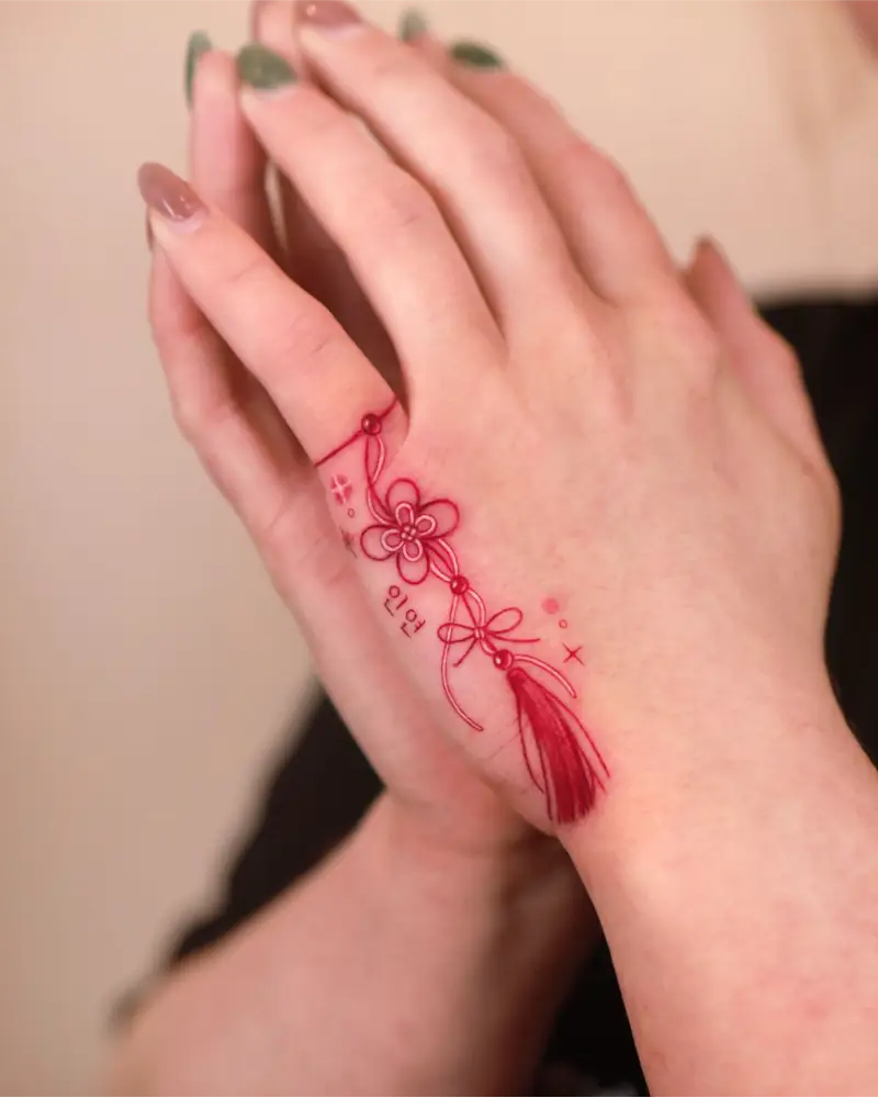 Red Norigae Charm Hand Tattoo