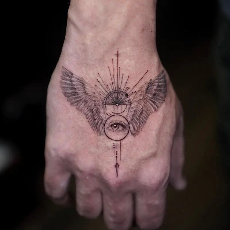 Sacred Eye Angel Wings Hand Tattoo