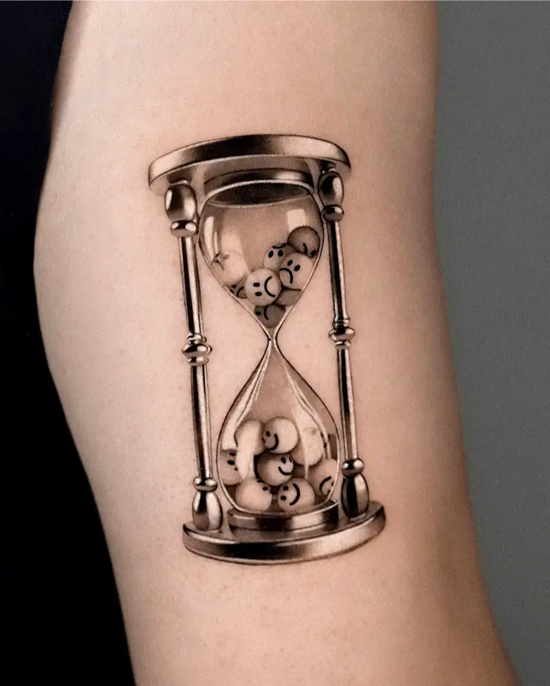Smiley Face Hourglass Tattoo