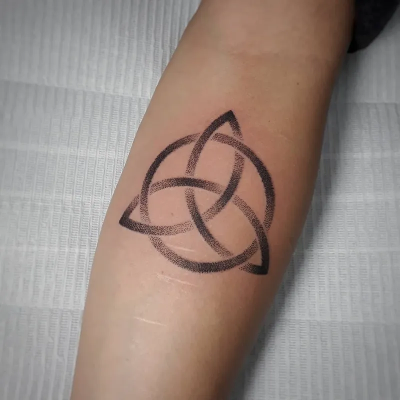 Soft Dotwork Trinity Knot Tattoo