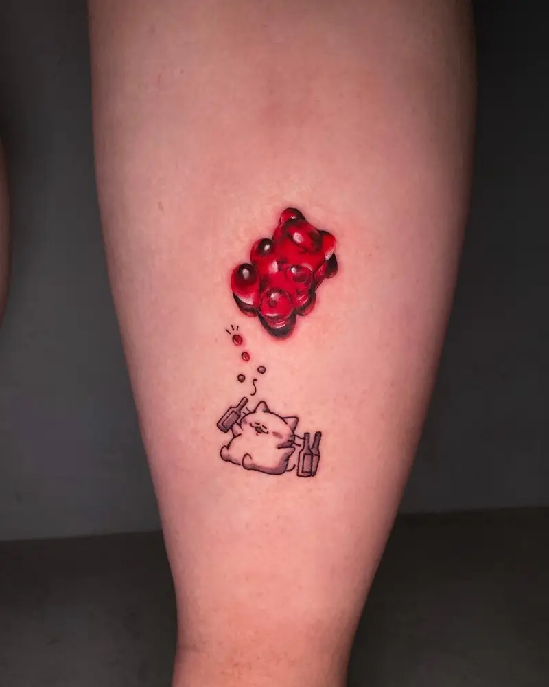 Surreal Drunk Cat and Gummy Bear Tattoo