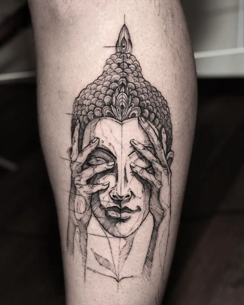 Surreal Hand Covering Buddha Face Tattoo