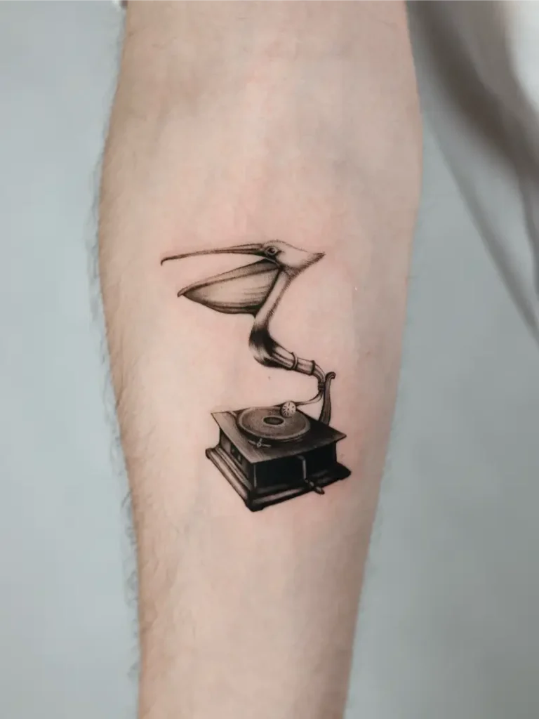 Surreal Pelican Record Player Tattoo